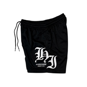 Black mesh shorts with white HI logo on a white background